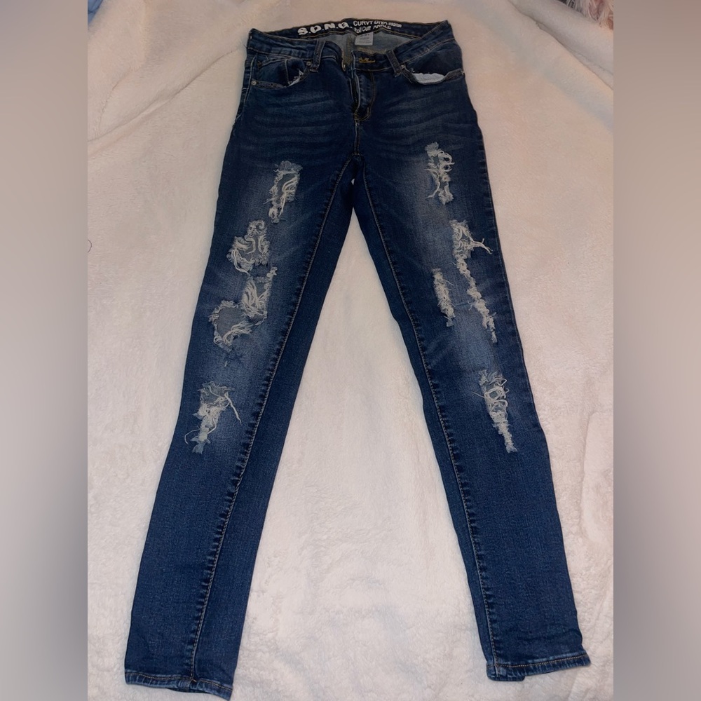 Skinny ripped jeans